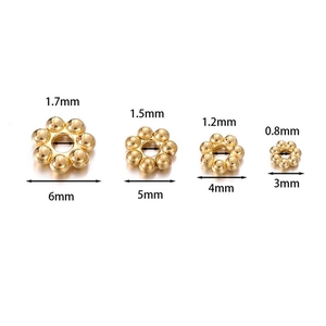 Confronto dimensioni perle distanziatrici a fiocco in acciaio dorato da 3mm a 6mm