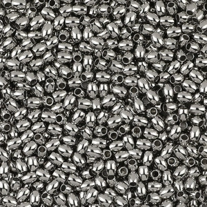 Macro shot of polished silver stainless steel spacer beads for DIY jewelry making