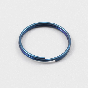 Macro shot of durable deep blue stainless steel double loop key ring with polished finish