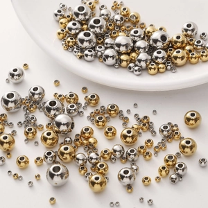 Polished gold and silver stainless steel beads in various sizes for DIY jewelry making