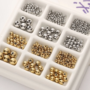 Polished gold and silver stainless steel beads in various sizes for DIY jewelry making