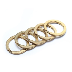 Flat brass key rings with brushed metal texture for DIY crafts and accessories