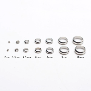 Various sizes of polished stainless steel spacer beads from 2mm to 10mm for DIY jewelry