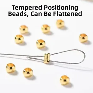 Macro shot of golden stainless steel positioning beads for DIY jewelry making