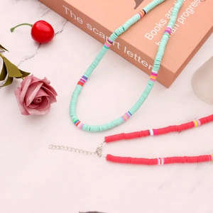 Detail view of colorful 6mm Heishi bead choker necklaces with silver lobster clasps