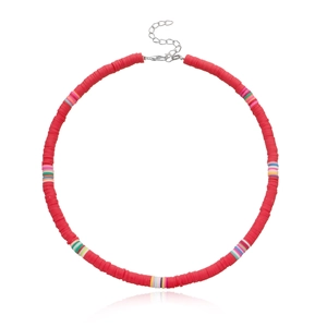 Detail of red heishi bead choker with rainbow accents and adjustable lobster clasp closure