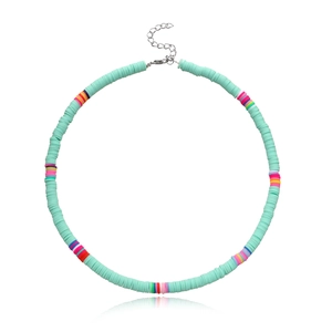 Detail of mint green polymer clay choker with colorful beads and silver lobster clasp
