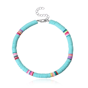 Detail of blue heishi bead anklet with colorful accents and adjustable lobster clasp