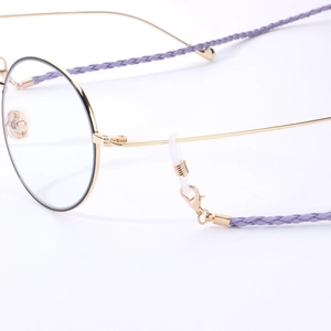 Fashionable purple braided leather eyewear strap with gold lobster clasps and silicone loops