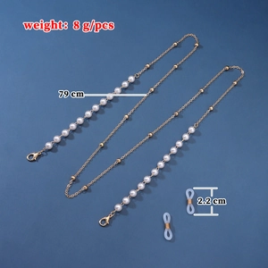 Detail of 79cm pearl and gold bead glasses chain with metal lobster clasps and silicone loops