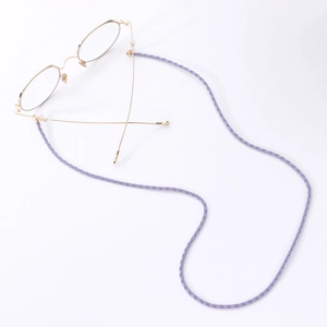 Detailed macro view of purple woven leather eyewear chain with adjustable silicone loops