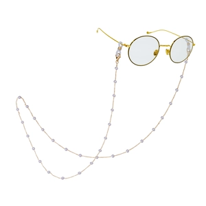 Elegant gold glasses chain with lavender pearls and silicone loops on round frames