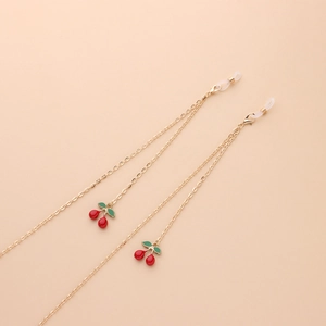 Golden eyewear chain featuring elegant red cherry pendants and non-slip loops