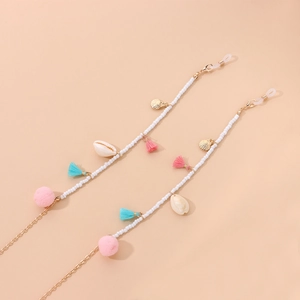 Bohemian eyewear chain with colorful tassels, pom-poms, shells, and white seed beads