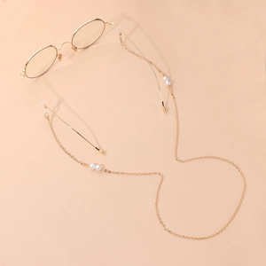 Chaîne de lunettes dorée élégante avec perles blanches et maillons fins minimalistes