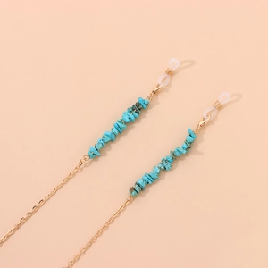 Chaîne à lunettes dorée avec pierres turquoise et boucles en caoutchouc de fixation