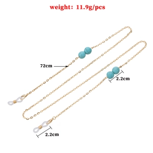 Catena per occhiali dorata da 72cm con perline turchesi e chiusure a moschettone donna