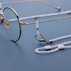 Golden round glasses chain with white daisy beads and silicone non-slip ends