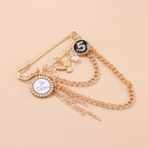 Vintage golden brooch with pearl disc No. 5 charm and layered punk style chains