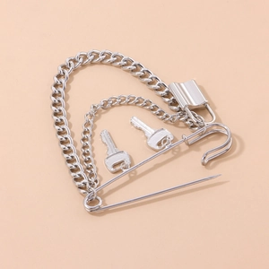 Punk style multi-layer metal chain brooch with silver lock and key charms on a safety pin