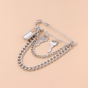 Silver lock and key safety pin brooch with metallic chain link in punk street style