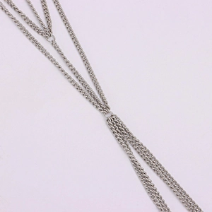 Detailed close-up of multilayer silver metal chains with circular ring connector joints