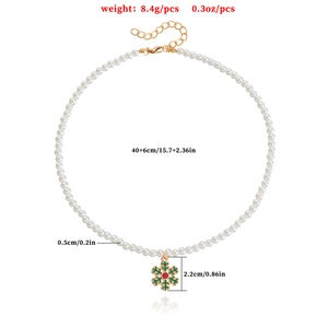 Christmas pearl necklace with green snowflake charm and red rhinestone pendant decoration