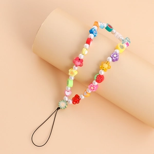 Dragonne colorée pour téléphone avec perles, fleurs acryliques et fruits en argile