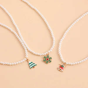 Elegant Christmas pearl necklace featuring festive tree, snowflake, and bell pendants