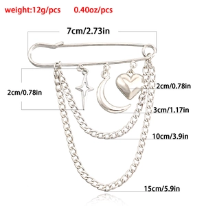 Silver punk safety pin brooch with layered metal chains, star and heart charms