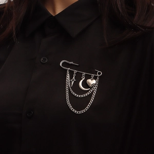 Silver safety pin brooch with hanging star moon heart charms and layered metal chains