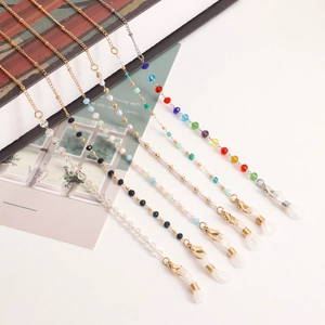Detail view of colorful beaded eyewear chains with lobster clasps and silicone loops