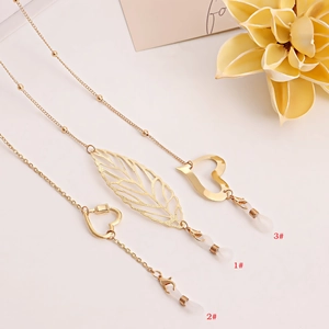 Chaîne de Lunettes en Alliage Doré Avec Pendentif Feuille Creuse Et Cœur Cordon de Masque Multifonctionnel pour Femme