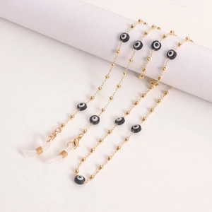 Golden metal chain for glasses or masks featuring evil eye beads and lobster clasps