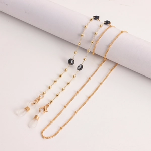 Gouden brillenketting met boze oog kralen en parels op minimalistische voet