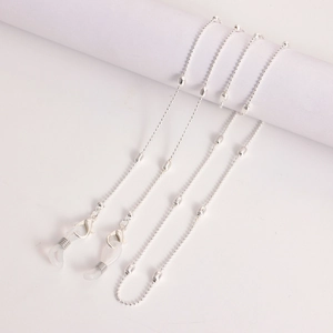 Detail of silver beaded eyeglass chain with lobster clasps and silicone loops