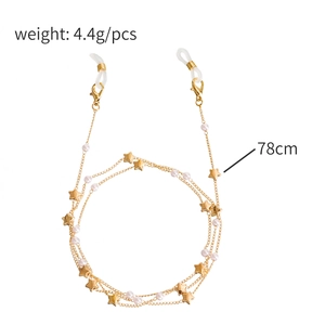 Golden eyewear chain with white pearls and stars, 78cm long with silicone ends