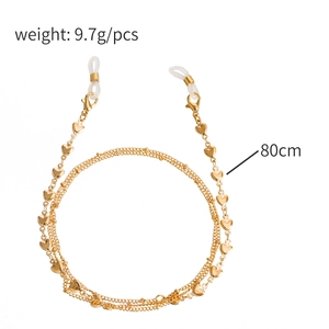 Chaîne de lunettes dorée avec breloques cœurs et boucles en silicone longueur 80cm
