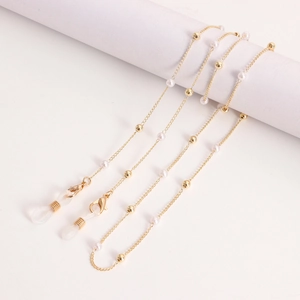 Elegant gold mask and glasses chain with white pearls and beads for versatile styling