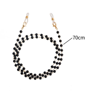 Chaîne élégante de 70cm en perles noires pour lunettes et masques avec fermoirs dorés et silicone