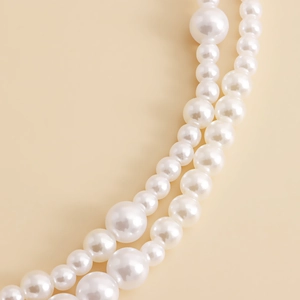 Chaîne de taille à double couche avec perles blanches polies de tailles alternées