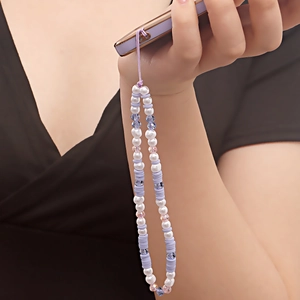 Purple handmade beaded phone strap with white pearls and clay disks for smartphones