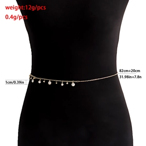 Elegant gold chain waist belt with pearl charms and zircons for a stylish tassel look