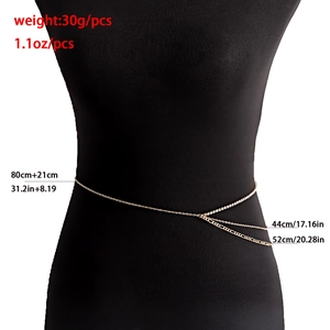 Multi-layer gold waist chain with imitation pearls and rhinestones on a female torso