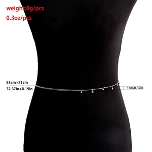 Gold star waist chain with zircon pendants on a black mannequin, length 83+21cm