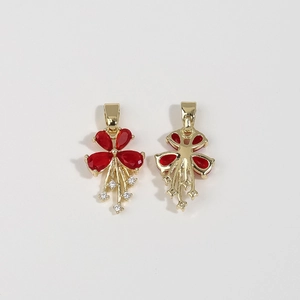 Golden flower pendant set with red gemstones and drop details shown from front and back