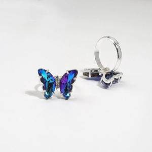 Elegant adjustable butterfly rings with blue-purple gradient crystals on silver bands