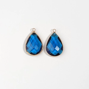 Pair of deep blue faceted water drop pendants with golden metal edging for DIY jewelry making