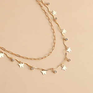 Double-layered golden waist chain with butterfly pendants and sparkling zircons for women