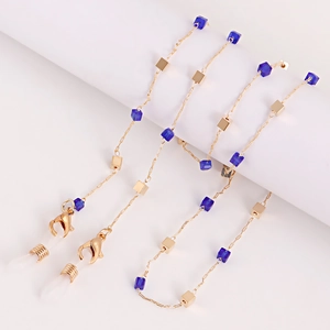 Chaîne de lunettes dorée avec perles de cristal bleu foncé et boucles antidérapantes